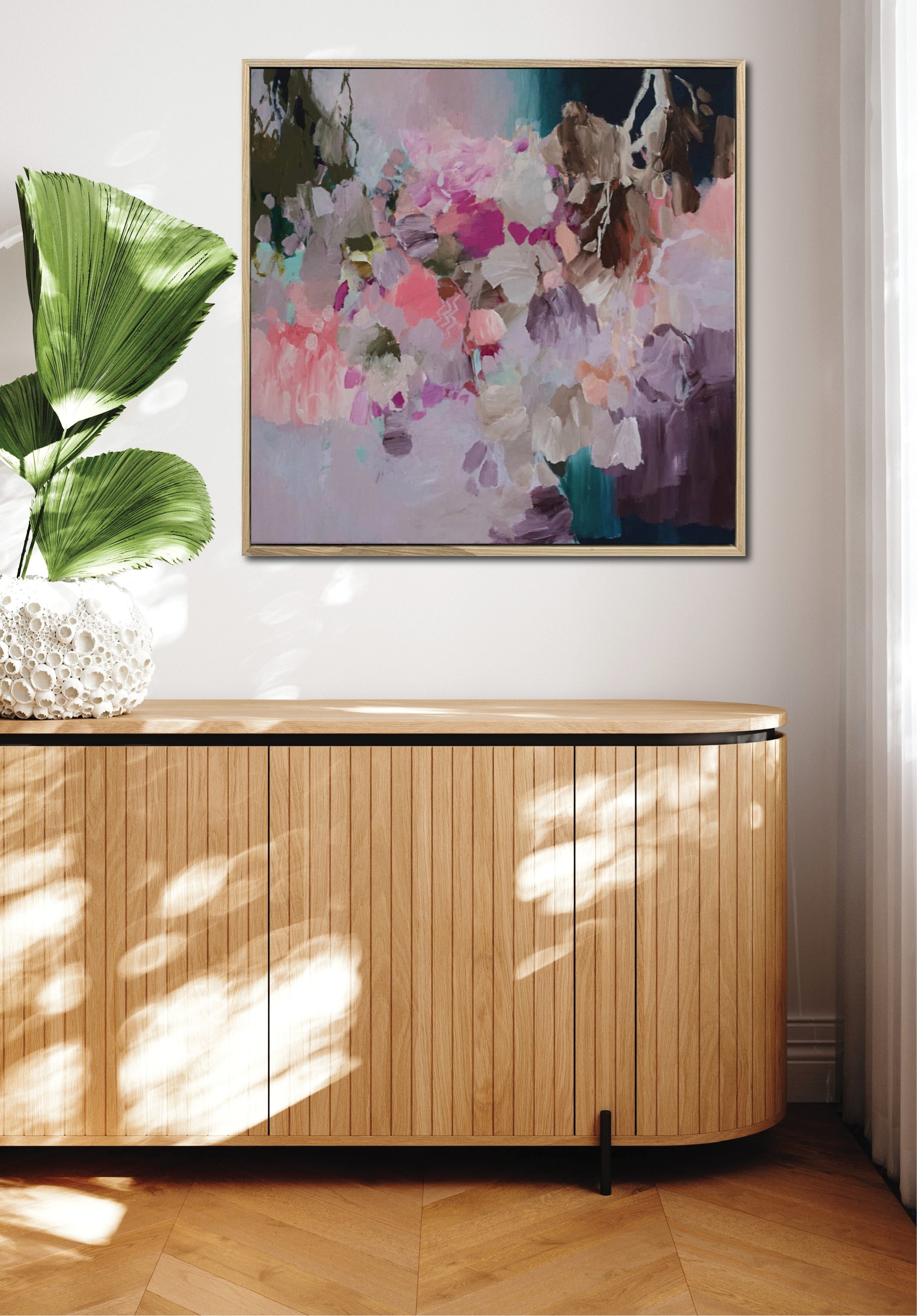 Beneath the quiet blooms