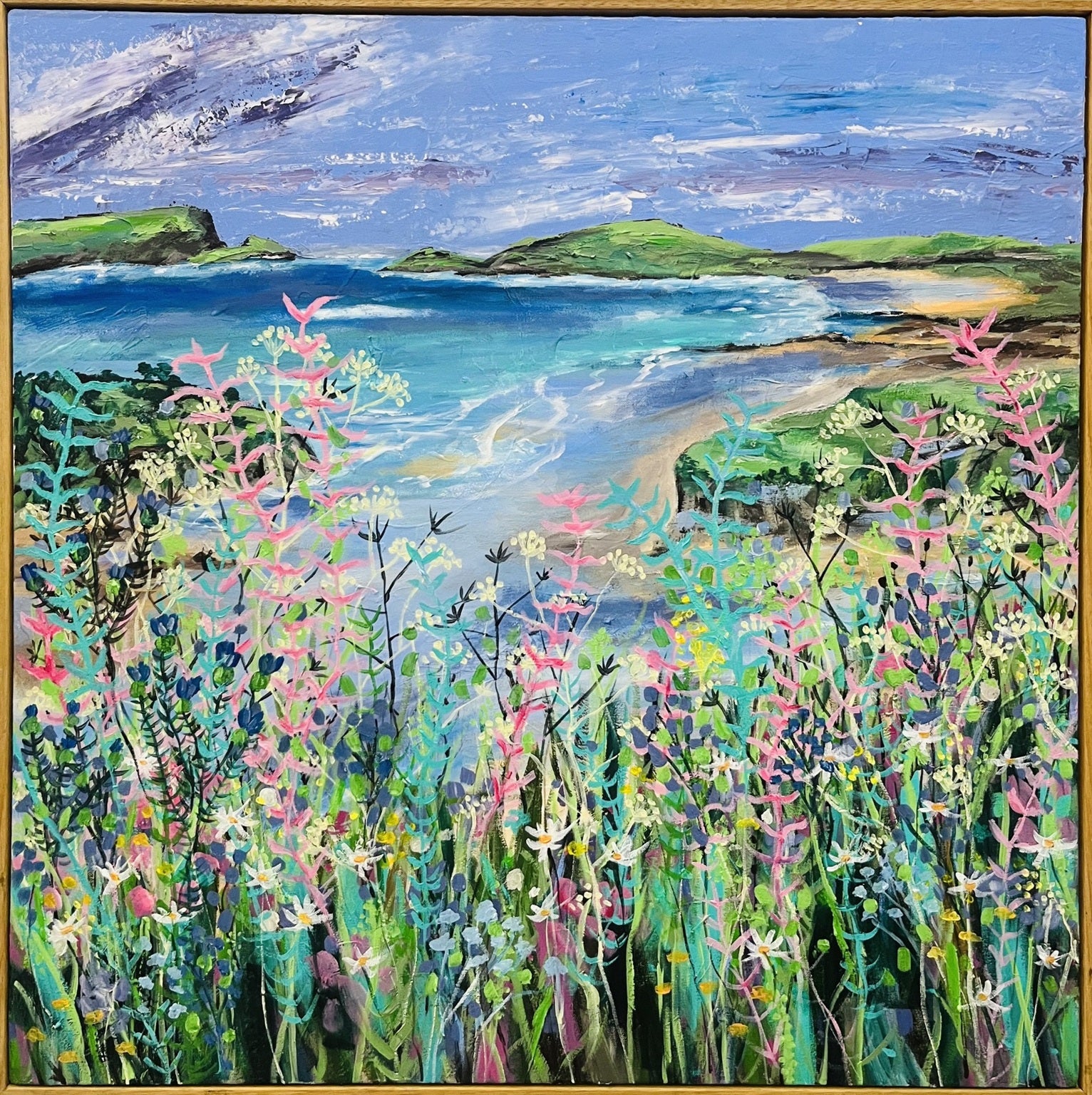 Where the wild shore blooms